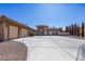 Expansive single-story home showcasing a neutral color palette, complemented by a spacious driveway and well-manicured landscaping at 271 E Shelbourne Ave, Las Vegas, NV 89123