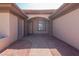 An arched entrance showing a walkway to a front door in a single-story home at 271 E Shelbourne Ave, Las Vegas, NV 89123