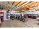 Organized garage with ample storage, workbench, and motorcycle displays, perfect for hobbyists and collectors at 271 E Shelbourne Ave, Las Vegas, NV 89123