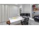 Bright home office with built-in shelving, a large desk, and plenty of storage at 271 E Shelbourne Ave, Las Vegas, NV 89123