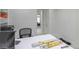 Contemporary office with a large desk, built-in shelves, and natural light at 271 E Shelbourne Ave, Las Vegas, NV 89123
