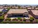 Backyard showcasing a covered patio, lush landscaping, and privacy at 2752 Fort Myer Ave, Henderson, NV 89052