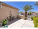Serene courtyard with stylish decor, outdoor seating, and mature landscaping offering privacy and charm at 2752 Fort Myer Ave, Henderson, NV 89052