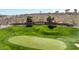 Scenic golf course view featuring lush greens, mature trees, and the Sun City Anthem sign at 2752 Fort Myer Ave, Henderson, NV 89052