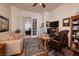 Comfortable home office with French doors and built-in shelving at 2752 Fort Myer Ave, Henderson, NV 89052