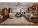 Inviting living room with hardwood floors and custom built-in shelving at 2752 Fort Myer Ave, Henderson, NV 89052