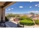 Back patio featuring mountain views, manicured greenery and ample seating at 2752 Fort Myer Ave, Henderson, NV 89052