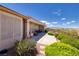 Covered patio with lush landscaping and desert views at 2752 Fort Myer Ave, Henderson, NV 89052