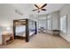 Bedroom with tile flooring, ceiling fan, bay windows with shutters, and a bunk bed at 2805 Hanging Rock Dr, Las Vegas, NV 89134