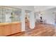 Stylish dining area offers hardwood floors, seamless flow into the kitchen, and a display cabinet at 2805 Hanging Rock Dr, Las Vegas, NV 89134
