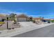 Charming single-story home with desert landscaping, and a two-car garage at 2805 Hanging Rock Dr, Las Vegas, NV 89134