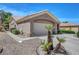 Charming home with desert landscaping, and a two-car garage at 2805 Hanging Rock Dr, Las Vegas, NV 89134