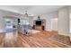 Well-lit living area features hardwood floors, a entertainment center, and a relaxing seating area with yard access at 2805 Hanging Rock Dr, Las Vegas, NV 89134