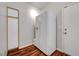 Office includes full-sized refrigerator and wood-look flooring at 2805 Hanging Rock Dr, Las Vegas, NV 89134