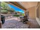 Covered patio with beautiful desert landscaping at 2805 Hanging Rock Dr, Las Vegas, NV 89134