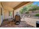 Comfortable patio with brick pavers, outdoor table, grill, and seating perfect for entertaining at 2805 Hanging Rock Dr, Las Vegas, NV 89134