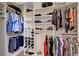 A custom walk-in closet offers ample storage with shelving and hanging rods for organized wardrobe space at 2805 Hanging Rock Dr, Las Vegas, NV 89134