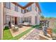 Inviting backyard patio with comfortable seating and string lights at 2820 Sisteron Ct, Henderson, NV 89044