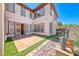 Inviting backyard patio with comfortable seating and string lights at 2820 Sisteron Ct, Henderson, NV 89044