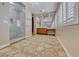 Spacious bathroom featuring a walk-in shower with marble walls and dual sink vanity with a large mirror at 2820 Sisteron Ct, Henderson, NV 89044