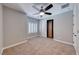 Bedroom featuring carpet floors, ceiling fan, and a closet at 2820 Sisteron Ct, Henderson, NV 89044
