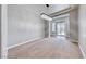 Dining room space with a modern chandelier and sliding glass doors at 2820 Sisteron Ct, Henderson, NV 89044