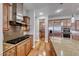 Gourmet kitchen with stainless appliances, granite countertops, and an island for food preparation at 2820 Sisteron Ct, Henderson, NV 89044