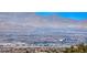 Landscape view overlooking city sprawl in front of a mountain range under a blue sky at 2820 Sisteron Ct, Henderson, NV 89044