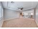Unstaged living room next to the loft, featuring new paint and carpet at 2820 Sisteron Ct, Henderson, NV 89044