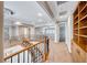 Spacious loft area with a decorative railing and built in shelving at 2820 Sisteron Ct, Henderson, NV 89044