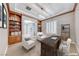Office space featuring built-in shelving, desk and chair, and glass doors at 2820 Sisteron Ct, Henderson, NV 89044
