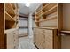 A walk-in closet with built-in shelves and drawers provides ample storage space at 2820 Sisteron Ct, Henderson, NV 89044