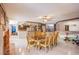 Large dining room featuring tile floors, a fireplace, and open access to the kitchen at 3617 Dutch Valley Dr, Las Vegas, NV 89147