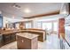 Spacious kitchen features granite countertops, a center island, and stainless steel appliances at 3617 Dutch Valley Dr, Las Vegas, NV 89147