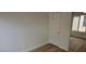 Bedroom with wood-look floors, closet and a large window at 3750 Morning Canyon St, Las Vegas, NV 89147