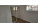 Bedroom with carpeted floors, closet with mirrored doors and a window at 3750 Morning Canyon St, Las Vegas, NV 89147