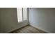 Bright bedroom featuring wood-look floors and a window at 3750 Morning Canyon St, Las Vegas, NV 89147
