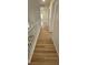A long hallway featuring wood floors and access to rooms at 3750 Morning Canyon St, Las Vegas, NV 89147
