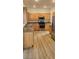 Updated kitchen featuring stainless steel appliances, granite countertops, and wood cabinetry at 3750 Morning Canyon St, Las Vegas, NV 89147