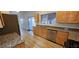 Updated kitchen featuring stainless steel appliances, granite countertops, and wood cabinetry at 3750 Morning Canyon St, Las Vegas, NV 89147