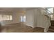 Open floor plan with white staircase and view of covered patio with backyard access at 3750 Morning Canyon St, Las Vegas, NV 89147