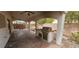 Large covered patio with a built-in outdoor kitchen and BBQ at 3750 Morning Canyon St, Las Vegas, NV 89147