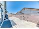 Spacious backyard patio with block wall and mature landscaping at 4381 Toledo Ave, Las Vegas, NV 89121