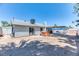 Large backyard with covered patio and hot tub, great for entertaining at 4381 Toledo Ave, Las Vegas, NV 89121