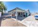 Spacious backyard featuring a covered patio and a hot tub at 4381 Toledo Ave, Las Vegas, NV 89121