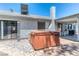 Backyard featuring hot tub, stucco walls, patio, and desert landscaping at 4381 Toledo Ave, Las Vegas, NV 89121
