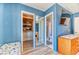 Bright bedroom with a ceiling fan, closet and ensuite bath at 4381 Toledo Ave, Las Vegas, NV 89121