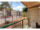 View from a unit patio with a railing looking out at the complex and landscaping at 440 Elm Dr # 103, Las Vegas, NV 89169