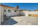 Backyard patio featuring outdoor seating and a partial block wall providing privacy for relaxation at 445 Concord Way, Henderson, NV 89015