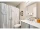 Bathroom with modern vanity, toilet, shower-tub combo with stylish curtain, and clean design at 445 Concord Way, Henderson, NV 89015